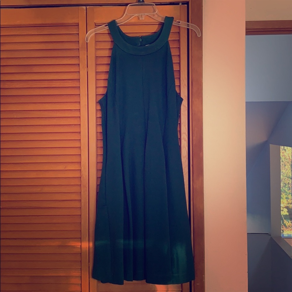 The perfect holiday dress in forest green!